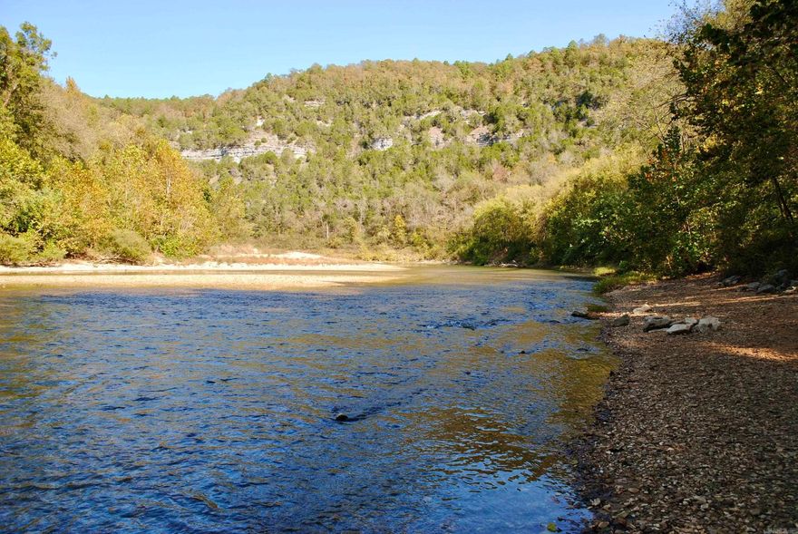 Properties like this are truly rare! Bordering the Buffalo National River and situated on a county road, this unique parcel offers endless possibilities for those seeking adventure and tranquility. Whether you're envisioning a cozy cabin retreat or a scenic camping getaway, this is the perfect spot to immerse yourself in all that the Buffalo River has to offer.  Located within walking distance of the Buffalo River Trail/Overland Highlands Trail, you’ll have direct access to breathtaking hikes along the river’s rim. Just 1 mile from the Spring Creek Recreation Area, this property provides easy access to fishing, kayaking, hiking, and more.  While utilities are not currently on-site, electricity is nearby, making future development convenient. Don’t miss this rare opportunity to own land in one of Arkansas’s most sought-after outdoor destinations. Schedule your private showing today and start planning your dream escape along the Buffalo National River!