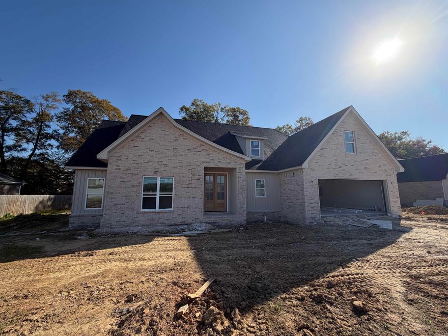 Beautiful home under construction in Morrilton. Agents, see attached documents to see the floor plan and finishings. Now with a BONUS ROOM upstairs!! Price increased due to the square footage increase.