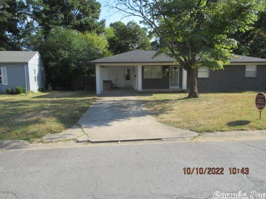 Wow factor! Home has many updates; 3 bdrm, 2 baths, 2 living areas. Open kitchen/dining area (bar for extra seating Granite countertops. Hardwood floors, tile  throughout. Appliances: SS refrigerator, microwave, dishwasher and gas stove. Fireplace in 2nd living room. Pantry, laundry room with extra storage. New lighting/fans, covered wood deck leading to spacious fenced yard and extra storage building. Newer roof and carport ;near all WLR shops. Your next home is here!