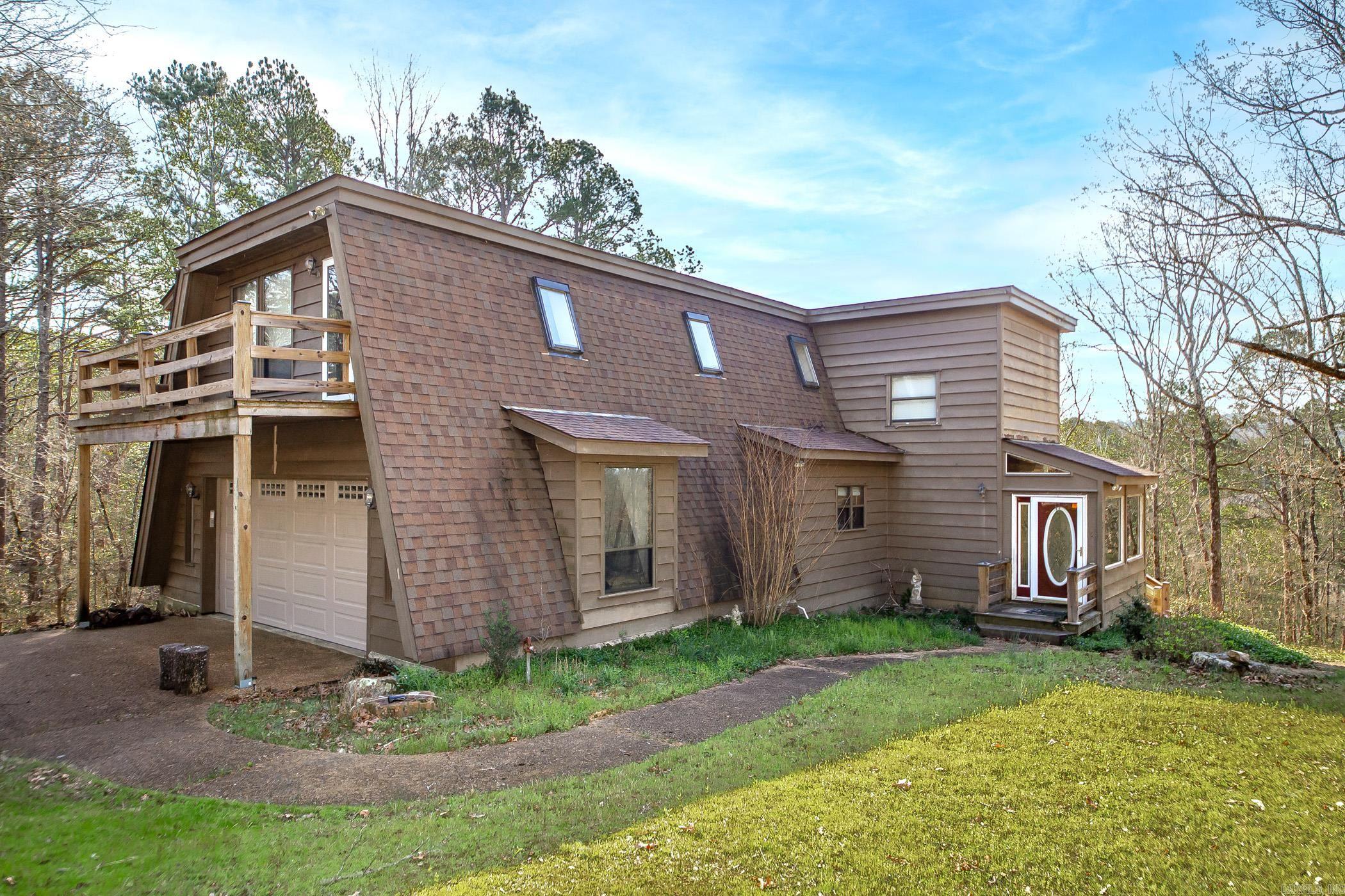 This stunning home is a must see, located at the end of the road. Inside features 2,553 sq.ft, 3BD/3.5BA, 940 sq.ft. heated and cooled basement, providing plenty of room for your family. The large kitchen features an island and is open to the living area, where you can enjoy the wood-burning fireplace. Upstairs features the primary bedroom w/ en suite and deck, and two other spacious bedrooms w/ nice size closets. Other features of the home : basement that is partially finished, new deck 3 years ago, new HVAC unit 3 years ago, windows and shingles replaced shortly after, and the home sits on 2 lots that total 0.60 acre.