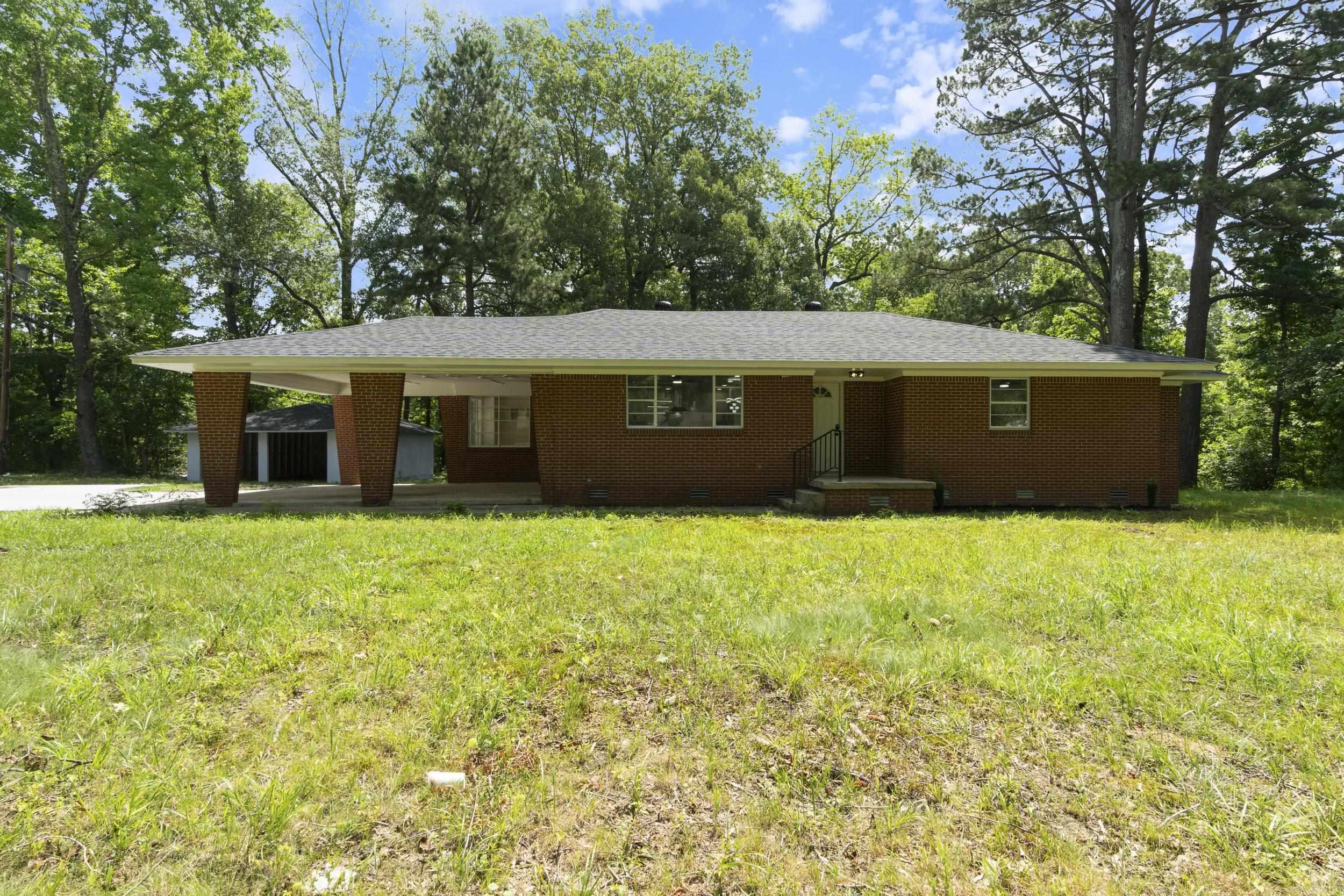 Fully renovated and move-in ready on 1.49 acres, this modern-yet-charming all-brick home offers 4 large bedrooms, 3 stylish bathrooms, and an open-concept layout filled with natural light. Everything is brand new—roof, HVAC, tankless water heater, flooring, fixtures, kitchen, bathrooms, and even a freshly poured driveway with expansion potential. Enjoy a large laundry room, a spacious primary suite, and room to spread out both inside and out. Located in a peaceful, accessible area just minutes from city amenities, this home combines country space with modern convenience—and the seller is even open to fencing the yard for you!