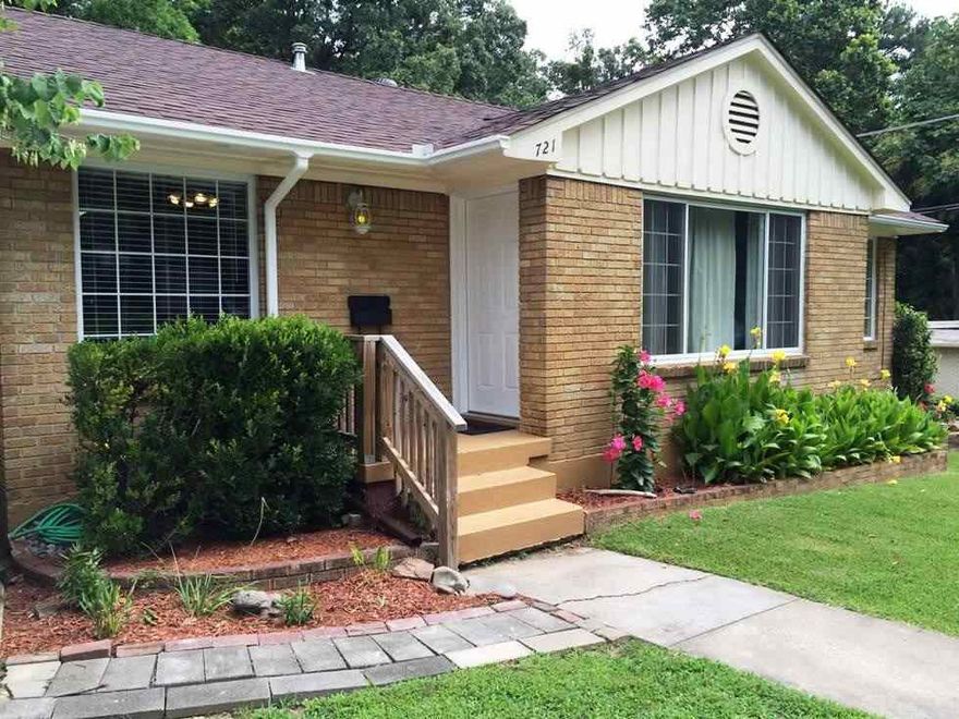 This is an adorable, move-in ready updated home that still has all of the character of the Park Hill area.  The living room has a gas log fireplace and is open to the dining room which is a great size for all your entertaining needs. Two bedrooms and one bath are located upstairs while the third bedroom is downstairs. Both bathrooms have all new fixtures.  You're sure to spend a lot of time on your deck and in this beautiful shady backyard.  This little doll house is ready for you to call home. Roof 2014.