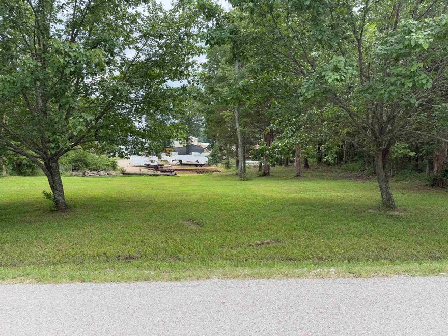 1.90 Acres zoned C-2.  Lot is partially wooded.  Nice shade trees.  Will subdivide. Utilities available but not on property.