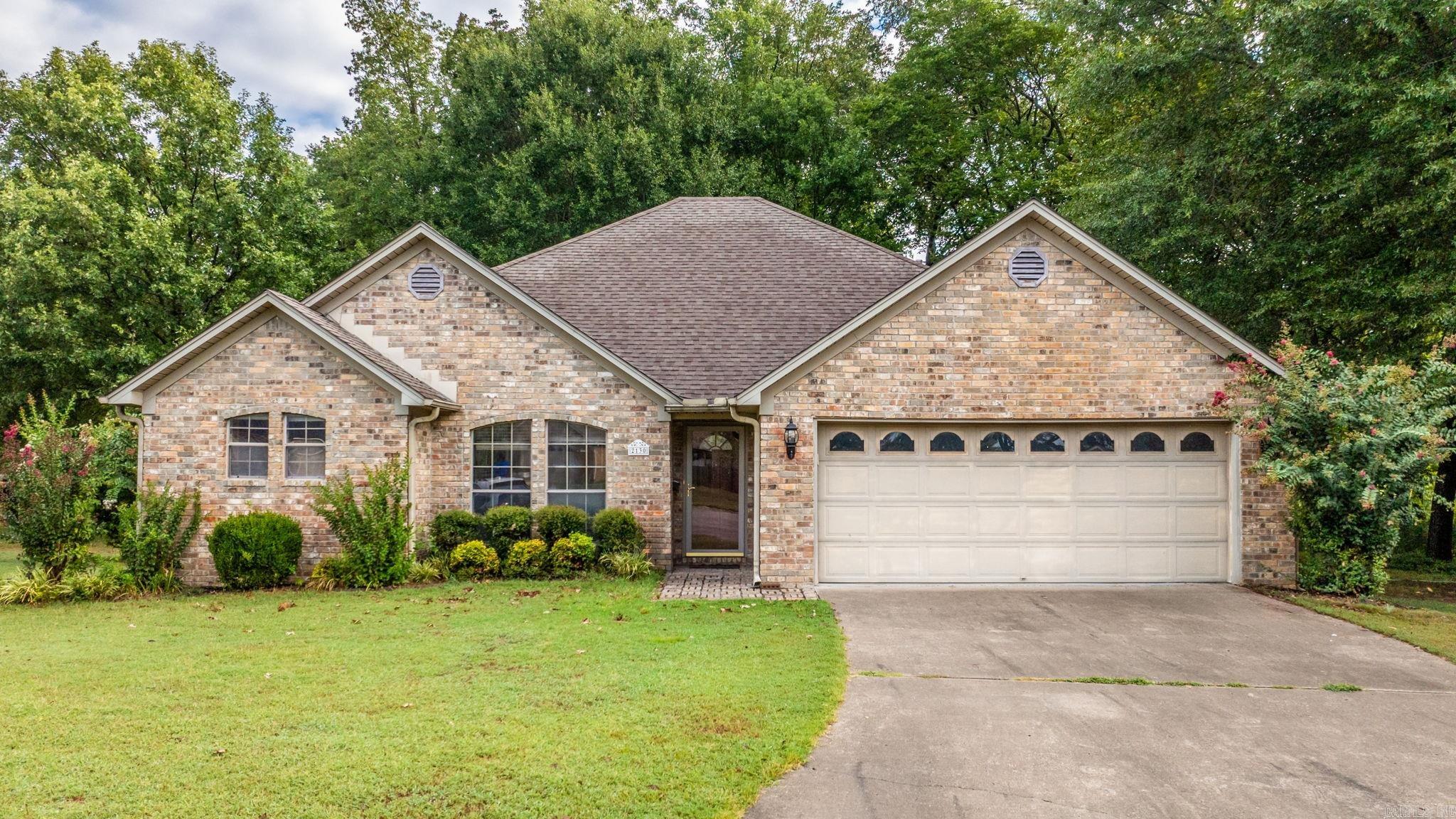 Welcome to 2130 Shade Tree Dr, a rare opportunity to own a well-kept home on 2+ private acres inside Conway city limits! Tucked away at the end of a quiet cul-de-sac, this property combines the convenience of in-town living with the peace and privacy of a country-like setting. The 3-bedroom, 2-bath home has been carefully maintained and features a comfortable layout with carpeted living areas and bedrooms. The roof and HVAC were both replaced approximately 5 years ago, giving you peace of mind. Step outside from the deck that overlooks your expansive lotāperfect for relaxing evenings or entertaining while taking in the serene surroundings. While the home has a more traditional style, the true value lies in the incredible property it sits on. Two acres in the heart of Conway is hard to come by, offering space to garden, play, or simply spread out and enjoy. Located close to shopping, dining, and schools, this property gives you the best of both worlds: convenience and seclusion. Homes with this much land inside city limits donāt come on the market oftenāschedule your showing today and see why you could make 2130 Shade Tree Dr your own private retreat that youāve been waiting for!