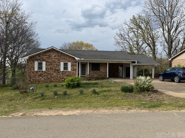 NICE BRICK HOME!! A well-maintained brick home of 1150 square feet with 3 bedrooms and 1.5 bathrooms, located at 2301 PYBURN EXTENDED, is available for $125,000. The home has central heat and air, a living room, kitchen/dining combo and a laundry room, with additional features like a sunroom, newer windows, a Safe Step walk-in shower/tub, Leaf Filter gutter covers, a basement workshop, and finished out storage room.
