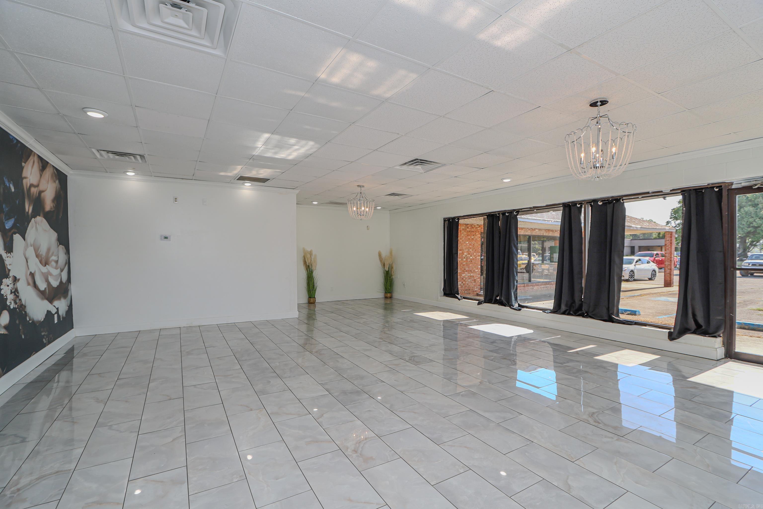 Commercial Property for Sale in Lake City! Looking for the perfect location for your business? Check out this space currently being used as a venue! With approximately 6,300 square feet of versatile space, this unit can be split into 2 separate spaces, the possibilities are endless. Located just off Highway 18 and a short drive from Jonesboro.