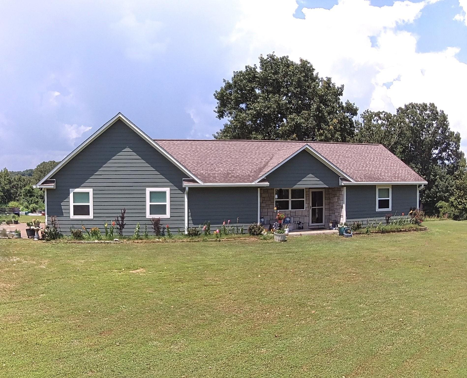 HOME SWEET HOME on 3 beautiful level acres & the VIEWS! Step inside this 3 bed/2 bath home & be welcomed by an airy open floor plan, vaulted wood ceilings, & a stunning rock fireplace. The spacious kitchen offers modern appliances, a breakfast bar, & a large pantry. The split floor plan features a private primary suite with a walk-in closet & oversized tiled shower. Two additional guest rooms also include walk-in closets. Outdoors, enjoy the covered porch & a patio, or take advantage of the impressive 30x30 shop with 12-ft wallsāfully wired & plumbed for a future bathroom. Concrete floors, insulated windows/doors, central heat & air, & a two-car attached garage add to the comfort & function of this well-built 2017 home. Located in Mount Pleasant with paved access & public water, this home combines peaceful country living with modern amenities. No matter where you are, you'll take in relaxing views of the rolling hills/pastureland that surround the property. With solid structure, open space, & a setting that delivers peace and a place to unwind - Schedule your private showing & come experience this for yourself! (more photos and virtual tour to come soon).
