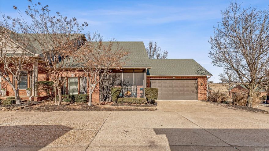 Welcome home to 4000 RidgePointe Cove, a 2-bedroom 2 bath condo in the prestigious RidgePointe Country Club neighborhood. This beautifully updated condo features hard surface flooring throughout, for easy cleaning and maintenance. The living room showcases a gas log fireplace, perfect for cozy evenings. With clean white cabinetry and granite countertops, the kitchen is sure to please any chef. The primary bedroom closet doubles as a storm/safe room. Parking is no issue here with an oversized 2-car garage and 2 parking spaces outside of the garage. Enjoy the outdoor space on your screened-in front porch or the back patio, overlooking the picturesque golf course. Take advantage of the amenities RidgePointe County Club offers: indoor and outdoor tennis, a swimming pool, a gym, an 18-hole golf course, and two restaurants. The water heater was just replaced in 2024. Call today for your private showing of this luxury RidgePointe condo!