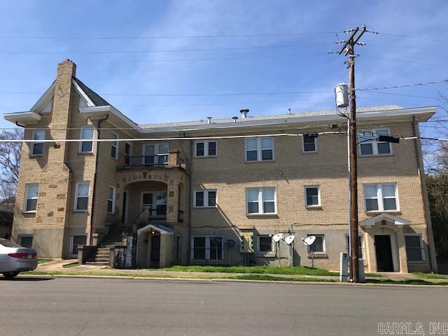 C-2 Zoning AND in the OPPORTUNITY ZONE for tax advantages! INVESTORS!! TAKE NOTICE!!! This downtown Hot Springs 6-plex is sitting convenient to courthouse, offices, public transportation & in walking distance of downtown attractions, shops & businesses. 6 spacious rental units in an extremely well built property with upgrades plus an additional large open space with half bath on lower level. It also includes 2 separate OFF STREET PARKING areas as well as a large adjacent grassy lawn area. Commercial City zoning (C-2) so optional uses may be available in addition to its current use as residential rentals. Current commercial zoning does not fall under the city's cap on number of STR units.