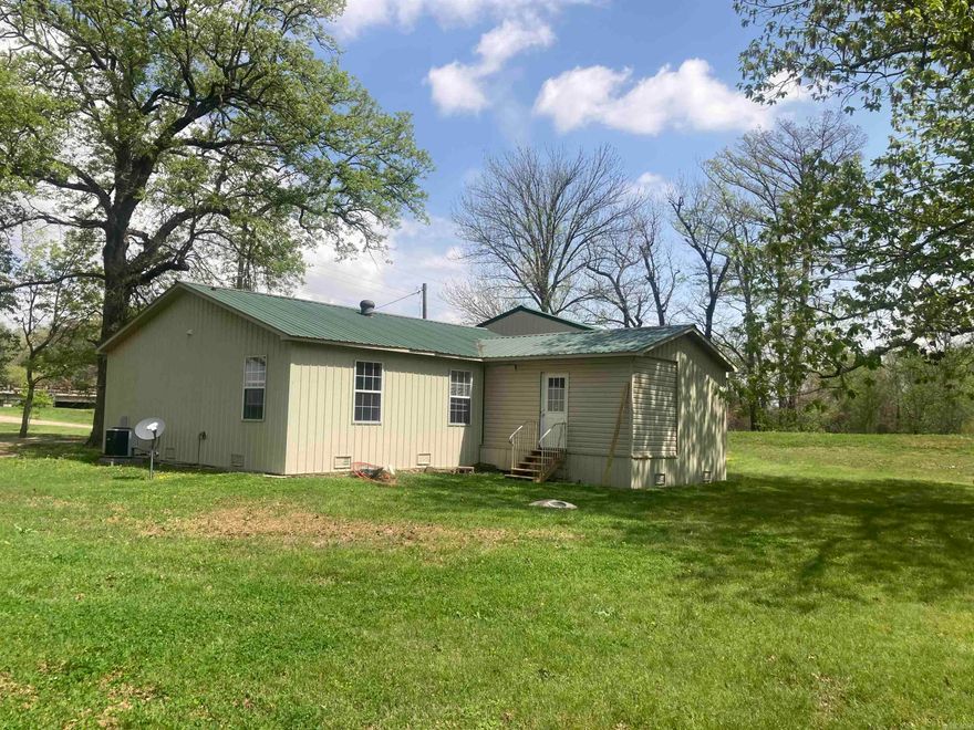 1042 square foot, single family home with a shop on 2 acres joining Bayou Deview near Morton AR. 2 Bedroom, 2 bath, carport and a great view of the Bayou.