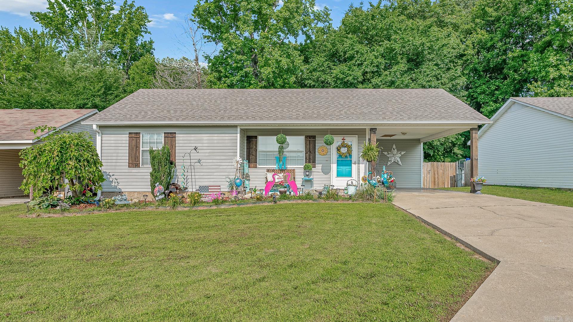 Welcome to your next place to call home! This very well-maintained 3-bedroom, 2-bathroom home features a spacious living area, perfect for relaxing or entertaining. Enjoy peace of mind with a roof that’s only 2 years old, brand new luxury vinyl plank flooring, fresh interior paint, and updated kitchen amenities including a new dishwasher and micro-hood. The kitchen also boasts stainless steel appliances, and the refrigerator stays! New fixtures throughout! Step outside to a large, fully fenced backyard with a covered patio—ideal for gatherings. Extras include a built-in wood swing and a freshly painted storage shed with a new door. Move-in ready and full of charm!