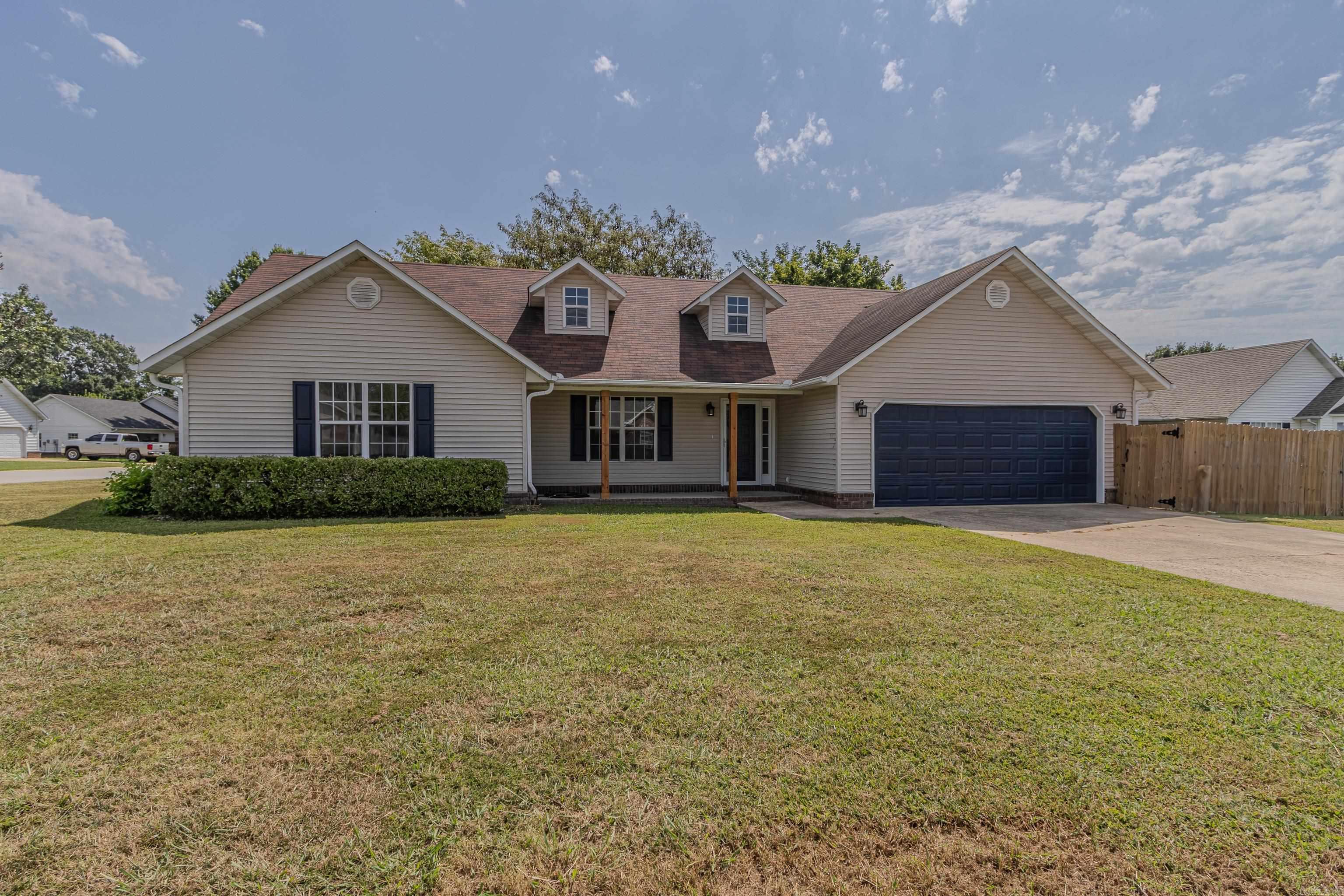 Welcome to this stunning, fully remodeled 4-bedroom, 2-bath home, perfectly situated on a spacious .21+/-acre corner lot in the desirable Southeast Paragould area. This all-electric home offers an open, inviting floor plan with luxurious LVP flooring throughout, creating a seamless flow from room to room. The heart of the home is the brand-new kitchen, featuring beautiful custom cabinets and sleek marble countertops, ideal for both cooking and entertaining. A cozy fireplace in the living room adds charm and warmth, making it the perfect place to unwind after a long day. The four generously sized bedrooms provide ample space and natural light, while the two remodeled bathrooms feature modern finishes and high-end fixtures. The home also boasts a large 2-car garage, offering plenty of room for vehicles, storage, or even a workshop. Situated on a corner lot, the partially fenced backyard provides both privacy and space for outdoor activities, and the slab foundation ensures a low-maintenance, solid structure. Located in a prime area of Southeast Paragould, this move-in ready home combines style, comfort, and convenience, making it the perfect place to call your own.
