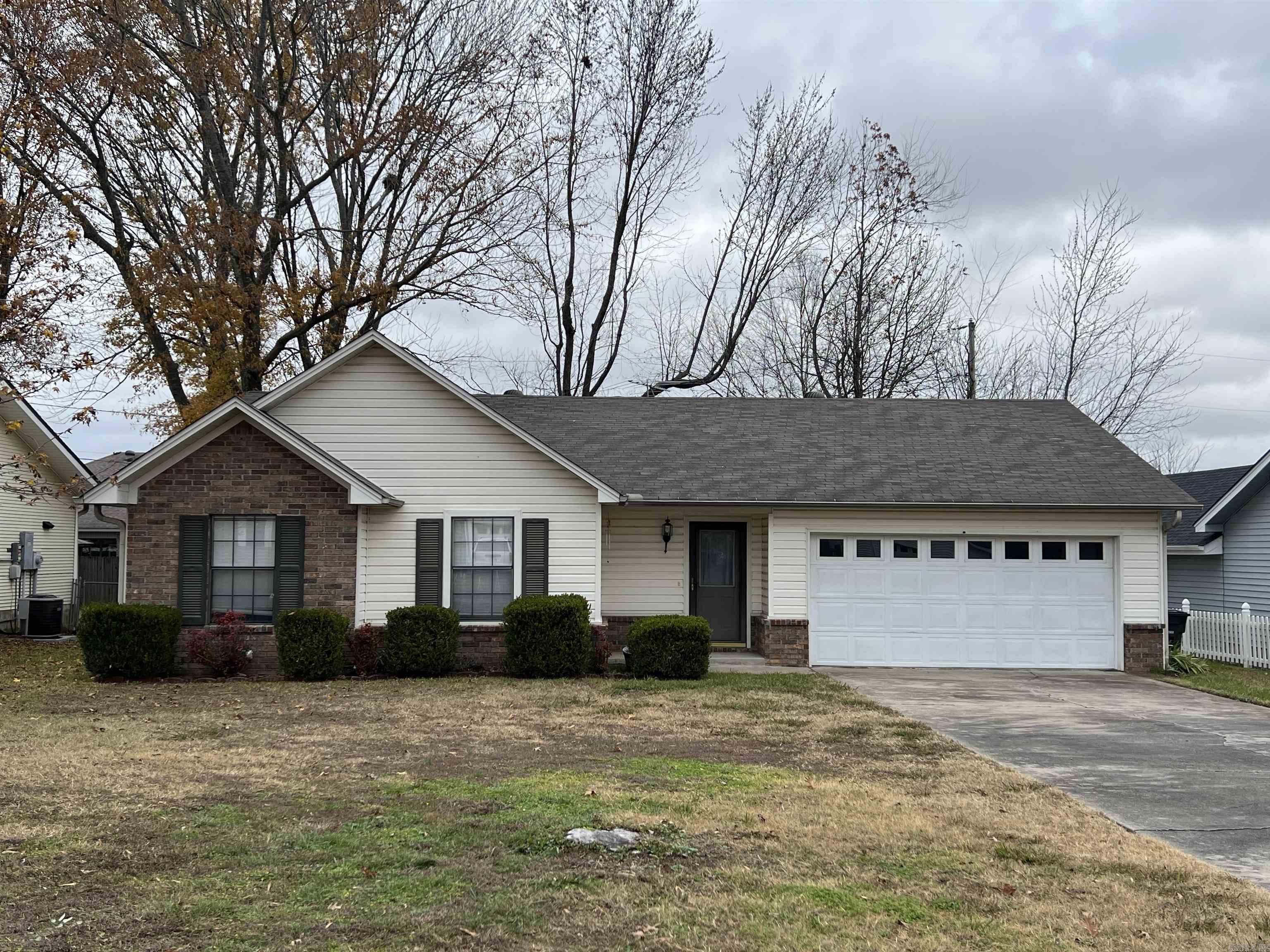 Super nice condition and Excellent value with this 3br 2ba home near LRAFB. 3br 2ba with over 1350sq ft. Vaulted ceiling in living area, gas fireplace, sbs fridge conveys, covered back patio, additional covered spot inside fenced back yard great for boat storage. Separate storage building, custom tile shower in primary bath, 2 car garage. Tons of potential for your finishing touches and updates.  Price is As-Is, inspections welcome, seller paying $750 1st yr home warranty.