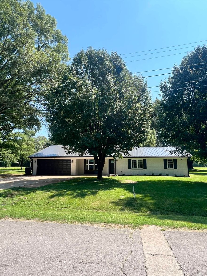 Completely remodeled & move in ready!  New cabinets, granite countertops, tile shower, luxury vinyl flooring, paint, appliances & more in this spacious 3 bedroom 2 bath home with shiplap accents all located in a beautiful setting.