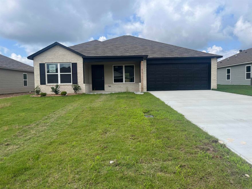 Discover the captivating Carnegie II plan, distinguished by its inviting covered entryway and beautifully landscaped front yard that exudes curb appeal. This thoughtfully designed home encompasses 4 bedrooms and 2 bathrooms, providing ample space for comfort and privacy. The spacious living room offers a welcoming environment for relaxation and gatherings. The kitchen is a chef's delight, equipped with energy-efficient appliances, abundant counterspace, and a convenient pantry for storage. The adjacent laundry room, situated just off the garage, ensures practicality for families of any size. The master suite includes a luxurious walk-in closet, enhancing the home's appeal and functionality. Explore more about this remarkable home today!  **SEE SHOWING REMARKS & AGENT REMARKS FOR IMPORTANT INFORMATION**