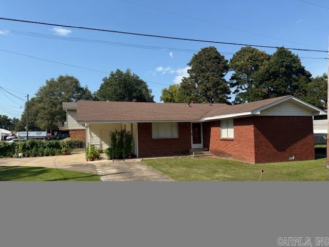 The home is perfect as a place to down size or start off.. It is neat and clean. Living room, kitchen, 3 beds, 2 baths with laundry. A fenced yard and carport are attached.