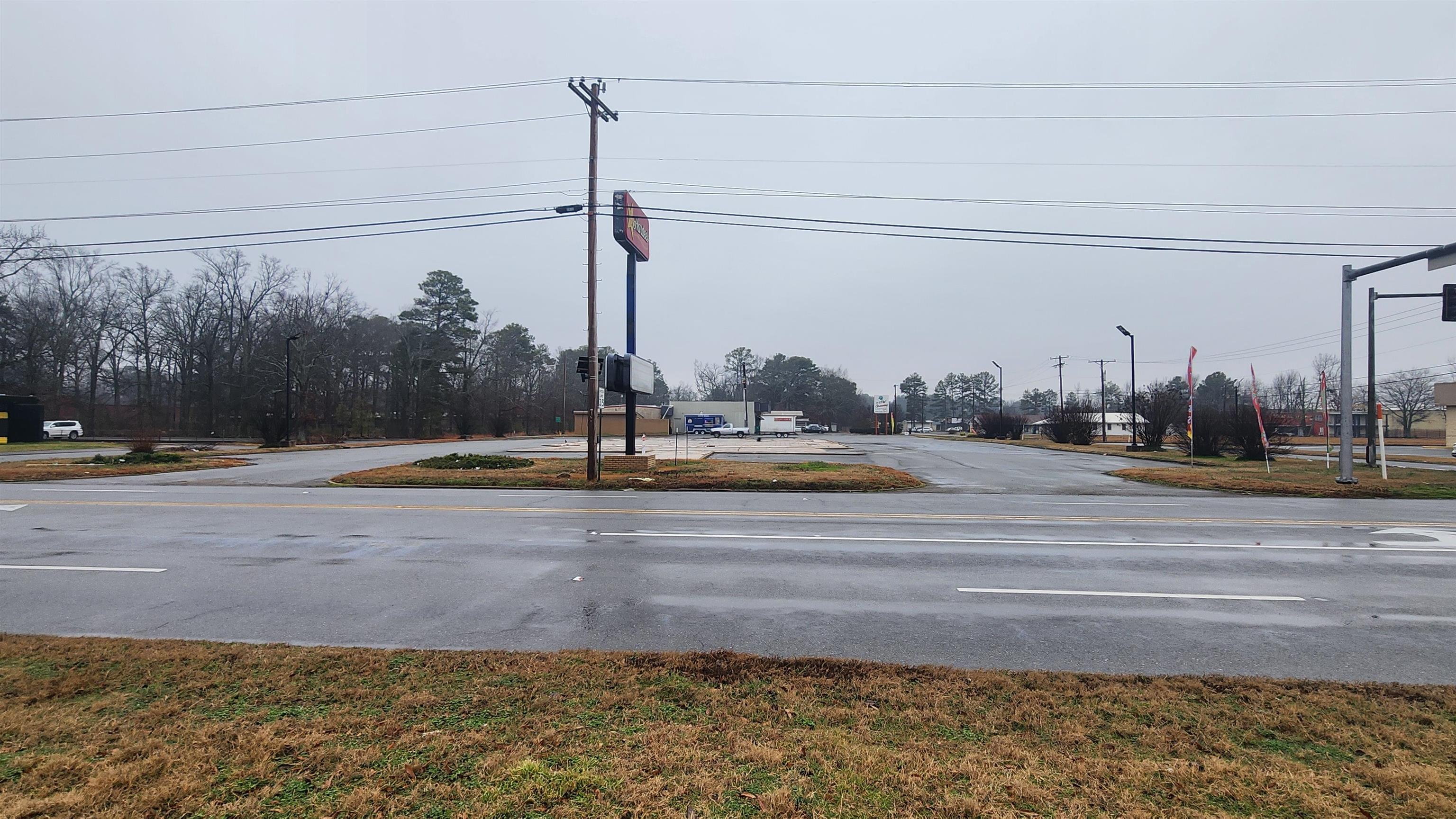 This lot is a blank canvas for your future business. It is on one of the busiest streets in Pine Bluff, and has all utilities present. There is ample asphalt parking and a slab ready for you to build on. There is no longer a building, but there is a storage building on the property. If you are looking for a lot of exposure....This Is It!
