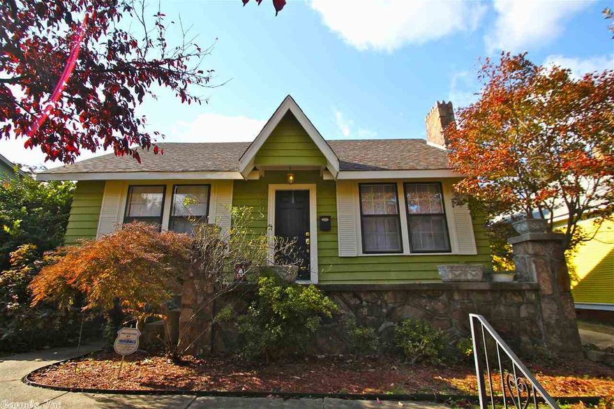This gorgeous and affordable, move in ready home has loads of charm! It features refinished hardwood floors throughout.  Updates in Kitchen & Bath.  Amazing views.  A beautiful stone fireplace in the living room. Large, fully fenced backyard w/ huge deck and storage shed.  Nice landscaping. Conveniently located minutes from Downtown, UAMS, the Heights and Hillcrest. The character you expect in an older home plus the updates you want in a new one. 1 Year Home Warranty.  Priced to sell & won't last long.