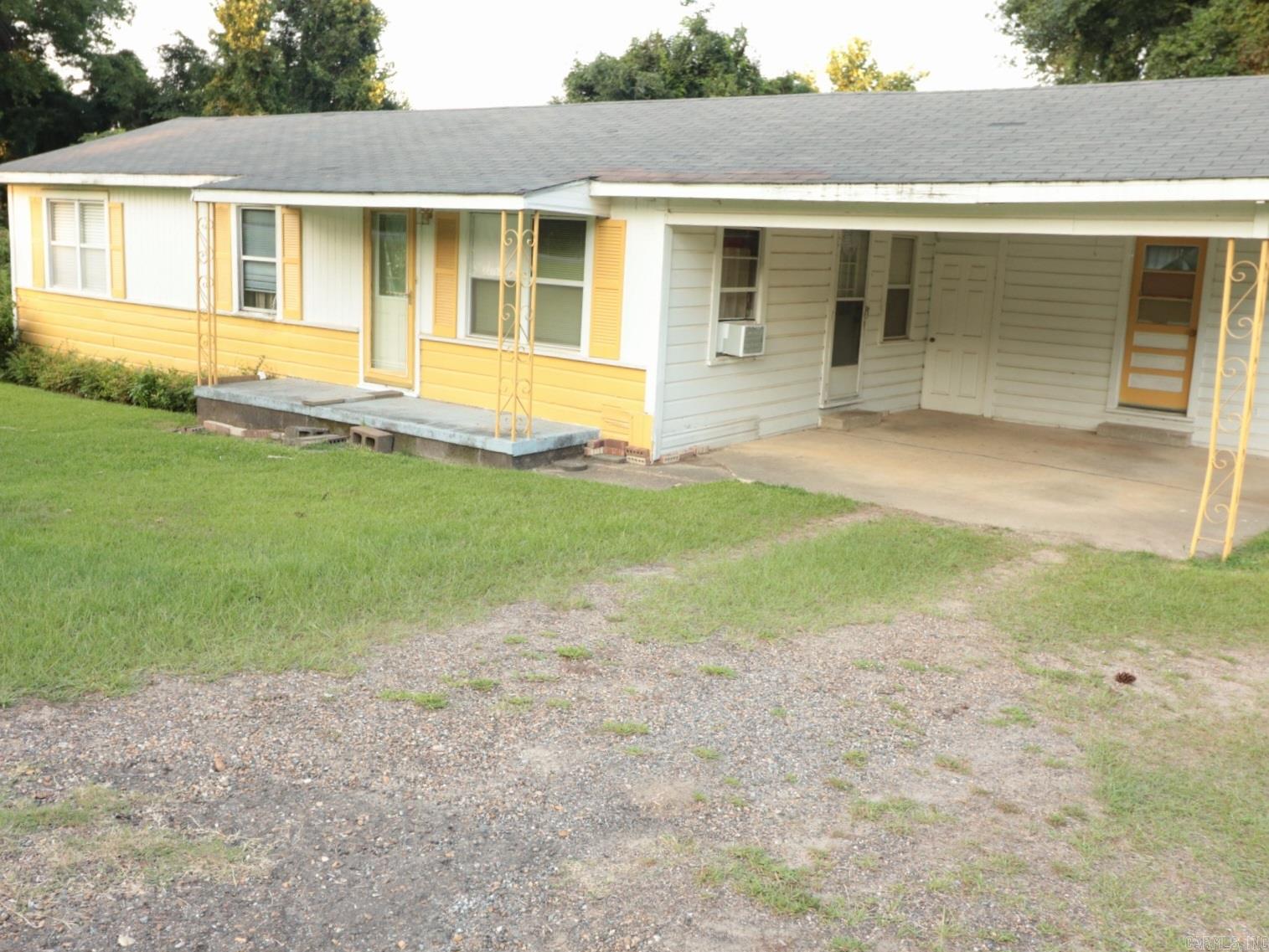 Come take a look at this 3 bedroom 1bath home nestled on .75 of an acre in the country. There's a half bath situated in the laundry room under the carport. This is peaceful country living located in MT. Holly, Arkansas just a short drive to El Dorado or Magnolia!! This property is located in the Smackover/Norphlet School District.