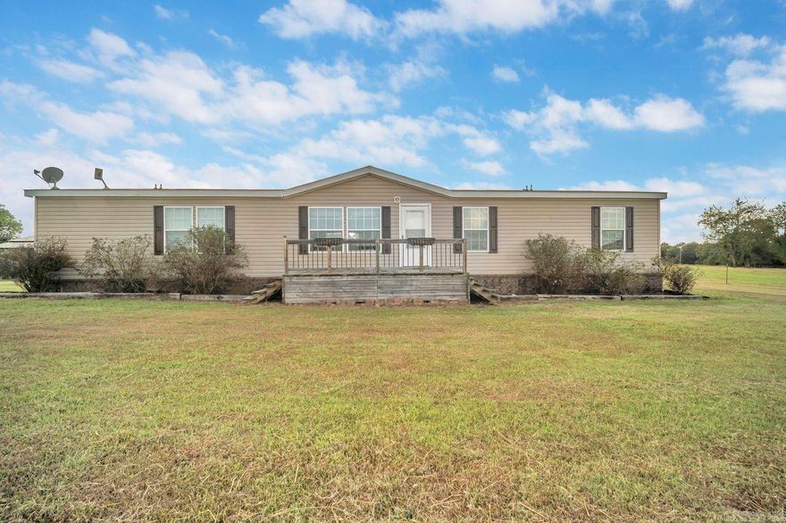 Nestled on 5.93 acres in the country with highway frontage, this 2017 Champion manufactured home is perfect for anyone seeking room to grow, while enjoying the comfort of modern living. 5 bedroom 3 bath, all electric appliances, providing energy-efficient living throughout. You will be welcomed with generous living spaces, including a bonus room that can be tailored to fit your needs-office, mudroom, or additional storage space. Shingled roof and permanent foundation with concrete footers ensures durability. Outside, the property is a true highlight: 24x30 shop with electricity. Perfect for storing tools, equipment, or pursuing hobbies. Plenty of space for gardening, a hobby farm, or outdoor projects. Enjoy the rural lifestyle you've always wanted!