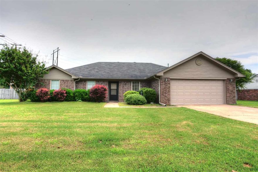 Great 4 Bedroom 2 Bath home on 3/4 acre lot in city limits.  Wood burning fireplace, corner lot, large great room.  Call to see today!