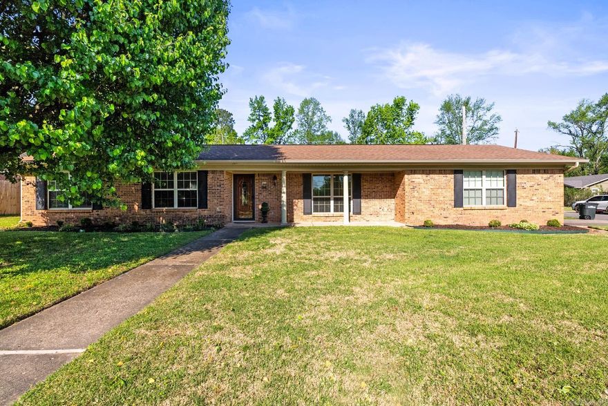 Come see your new home! This three bedroom cutie is so precious! You step inside to find a spacious living room bathed in natural light. To your left is a hallway that leads to the bedrooms and spare bath. Lots of storage in this home with plenty of closets for linens, coats, etc...Straight ahead you will find an oversized dining room/kitchen combo. The kitchen cabinets have been updated and gleam with owner pride. Enjoy your pantry closet and separate laundry room with additional cabinetry. The oversized two car sideloading garage with storage room is a wonderful feature of this brick home. Take time to relax in your nice flat backyard with covered patio area. There is a lot to love here! Make this a must see!