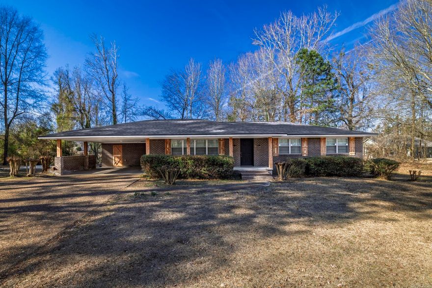 Fully renovated and truly move-in ready, this beautifully updated 3-bedroom, 2-bath home sits on a desirable city corner lot and offers the perfect blend of classic charm and modern updates. From the moment you step inside, you’ll appreciate the thoughtful renovations throughout. The kitchen, dining area, and sunroom feature brand-new flooring, while the bedrooms and living room showcase original hardwood floors that add warmth and character. Fresh paint and new fixtures give the home a clean, modern feel.  The kitchen has been completely transformed with new cabinets, stunning quartz countertops, and all-new appliances, making it both functional and stylish. Major updates provide peace of mind, including a new roof, new HVAC system, and a new hot water heater. The sunroom offers a bright, inviting space perfect for relaxing, entertaining, or enjoying your morning coffee.  Located on a spacious corner lot within the city, this home is a rare find that’s been fully updated and is ready for its new owners. Schedule your showing today and see everything this home has to offer.