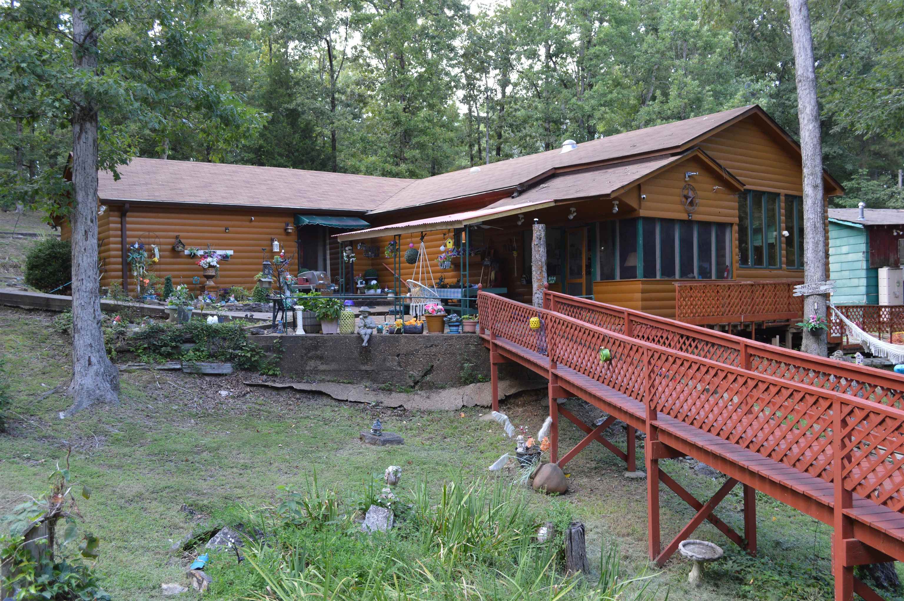 Lake Front Home on Beautiful Lake Poinsett just outside of Harrisburg. This home comes with five lots for a total of 2.04 acres on Settlemire Lane. With breath taking views of Lake Poinsett you can sit in a vaulted ceiling living area just off the kitchen, the master bedroom or the glassed in back porch to enjoy a sunrise over the water.