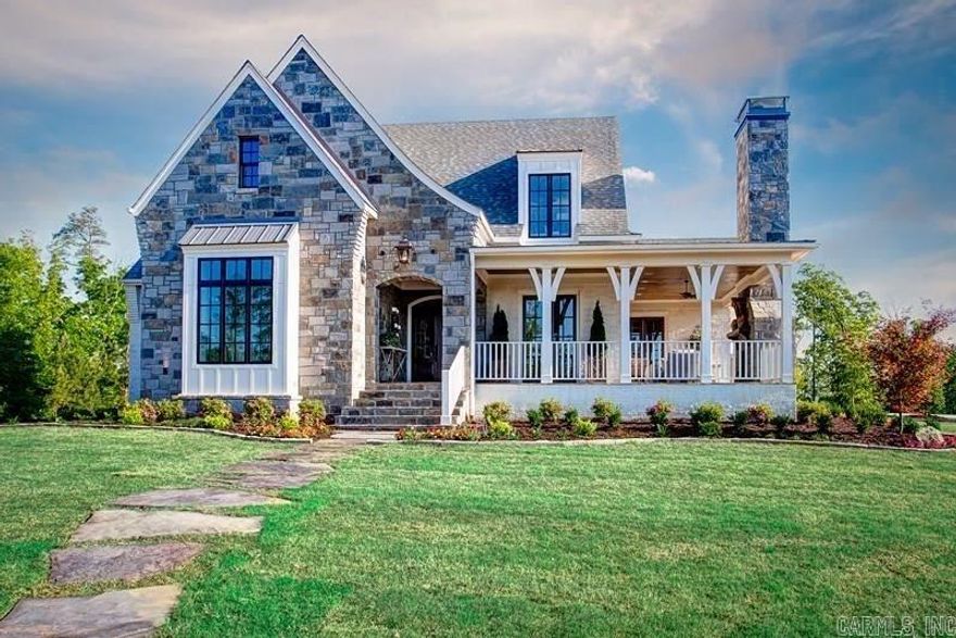 Southern Living showcase! 1.37 Acres with views of Pinnacle Mountain from front outdoor cozy fireplace! 5" white oak floors, exposed beams in open living area. French doors, butler's pantry, 10' ceilings, mud room/desk & marble vanities. Chef's kitchen- 42" Kitchenaid, 6 burner gas, farm sink, ice maker & Wellborn cabinets & marble c.tops. Marble MBTH, Maxx soaker tub & quartz laundry. Versatile bonus/game room up. Hunter Douglas Blinds. Tankless HWH w/recirculating. Luxury living-gated neighborhood.