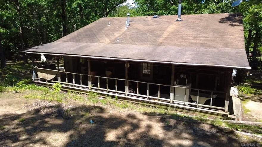 Tucked into the woods is your next retreat with National Forest Boundary! Your chance is here to own this 20 acre parcel with a spring-fed pond and a creek in one of the most sought-after areas of Polk County! Located just off Polk Road 42 near the Bethesda Lake Cabin complex, this property has many building sites, a 3 bedroom, 1 bath home, a 2-car garage, several outbuildings, and the privacy you are craving. This wooded parcel borders the National Forest on the south side and has loads of potential. Renovate the home for yourself or make it into a vacation rental. Wildlife abounds on this acreage!