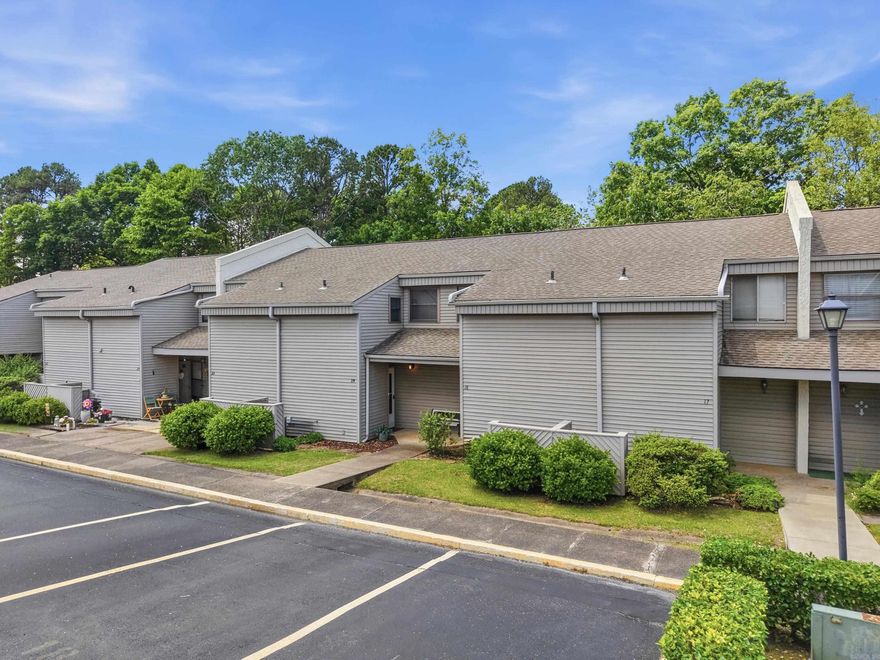 Beautifully updated and fully furnished 2BR/1.5BA Lakewood Hills condo in the heart of Fairfield Bay! This move-in-ready two-level condo offers stylish updates, comfortable living, and a fantastic location near all the area amenities. The open-concept living, dining, and kitchen areas create a warm and inviting space perfect for entertaining or relaxing. The remodeled kitchen features oak cabinetry, updated countertops, wainscoting, and quality appliances. Both bathrooms have been tastefully renovated, including a walk-in shower in the full bath. One bedroom includes a built-in office/TV nook with desk and cabinetry, while the spacious primary bedroom offers built-in drawers and an ironing board for added convenience and storage. Updated vinyl plank flooring, carpet, doors, windows, and light fixtures add to the fresh modern feel throughout. Step outside to a private patio overlooking a peaceful wooded setting, or enjoy the nearby private association pool. Conveniently located near shopping, restaurants, banks, pickleball, tennis, ATV/UTV trails, and only 10 minutes from Greers Ferry Lake. This one is ready to enjoy from day one!
