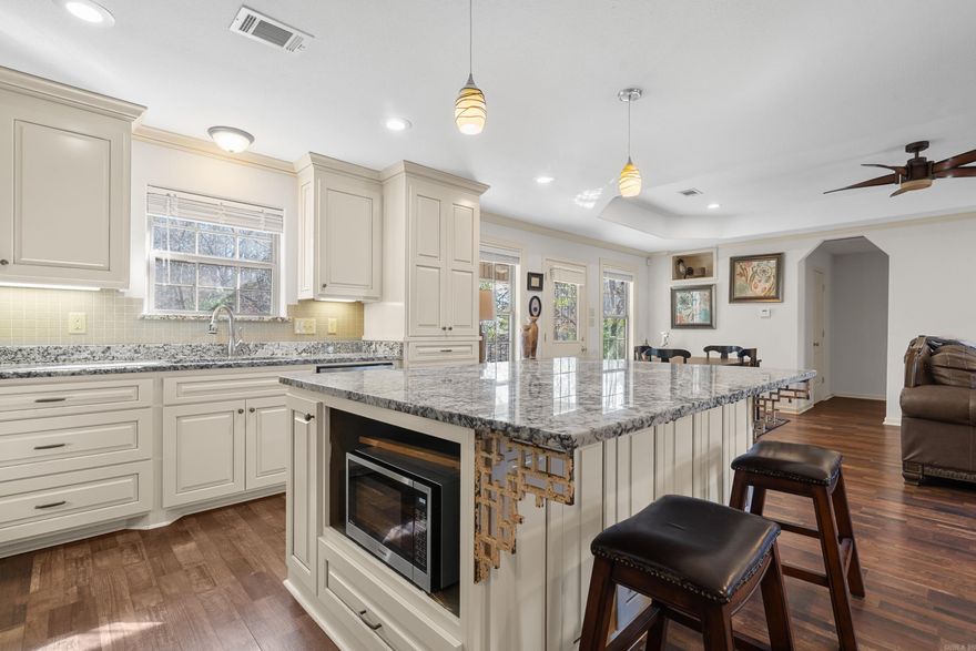 Built in 2018, this three-bedroom, 2.5-bath home offers modern design and easy living in the Lake Hamilton School District. The open, contemporary kitchen features a gas cooktop and flows seamlessly into the main living area, making it ideal for both everyday living and entertaining. A fireplace adds warmth and character to the space.  The primary suite includes a spacious walk-in shower, designed with comfort and accessibility in mind. Multiple decks extend the living space outdoors, offering great spots to relax or host guests. Yard maintenance made even simpler by sprinkler system.  Well-maintained and thoughtfully designed, this home combines modern finishes, functional layout, and a convenient location.