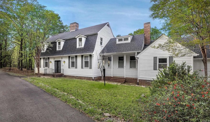 Beautiful williamsburg/colonial-style home sits on approximately 5.67 private, wooded acres, offering a peaceful retreat with abundant natural views. The home features built-ins in every bedroom, Primary bedroom could be upstairs or down. Enjoy a spacious sunroom, plantation shutters throughout, wood-burning fireplaces, two staircases, and a wet bar with custom cabinetry. The downstairs bath includes a sauna for ultimate relaxation. Step outside to an inground pool with a surrounding deck, a fenced playground area, and a charming she shed/workshop with greenhouse space. A 3-car garage offers a floored attic and covered patio with storage loft. Major updates include two new water heaters (2021), pool resurfacing and auto cover (2023), three HVAC units (2023–2025), and a new roof, paved driveway, and garage doors (2025). Located across from the Ouachita Trail near Lake Maumelle, this home blends comfort, convenience, and nature. Approx. 2.5 miles from Pinnacle Mountain state park.