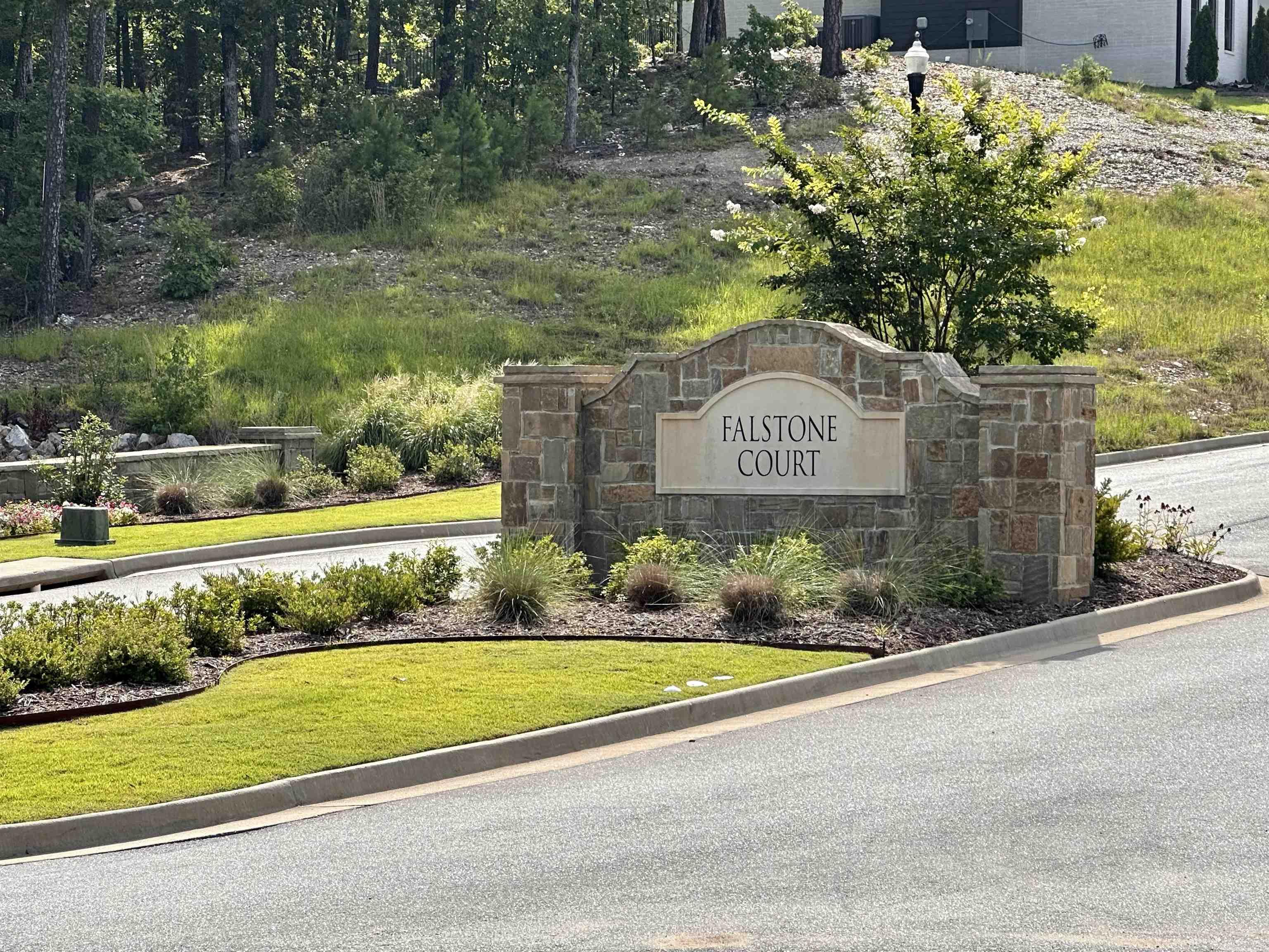 Beautiful lot ready for your dream home! Backs to greenbelt in Falstone Court. Enjoy a neighborhood in Chenal Valley with easy access to nearby dining, shopping, parks and pools. Choose your builder. Minimum square footage for a one level is 2200 and the multi level minimum is 2600.