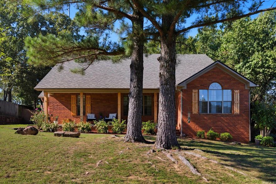 Welcome home to this charming cutie in Conway!  This single-story home offers 3 bedrooms and 2 bathrooms with a bright, open layout. Featuring big windows, updated flooring and fresh paint, you'll feel the bright, cheerful atmosphere created here.  The updated kitchen and dining area flow seamlessly into the living area with cozy gas fireplace.  The primary suite includes access to the backyard and an en-suite bathroom with two closets and ample vanity countertop space.  The fully fenced backyard backs to Conway's Tucker Creek Trail -- ideal for morning bike rides and evening walks!  Move-in ready and beautifully maintained, this home is ready to welcome you home! Agents, see remarks.