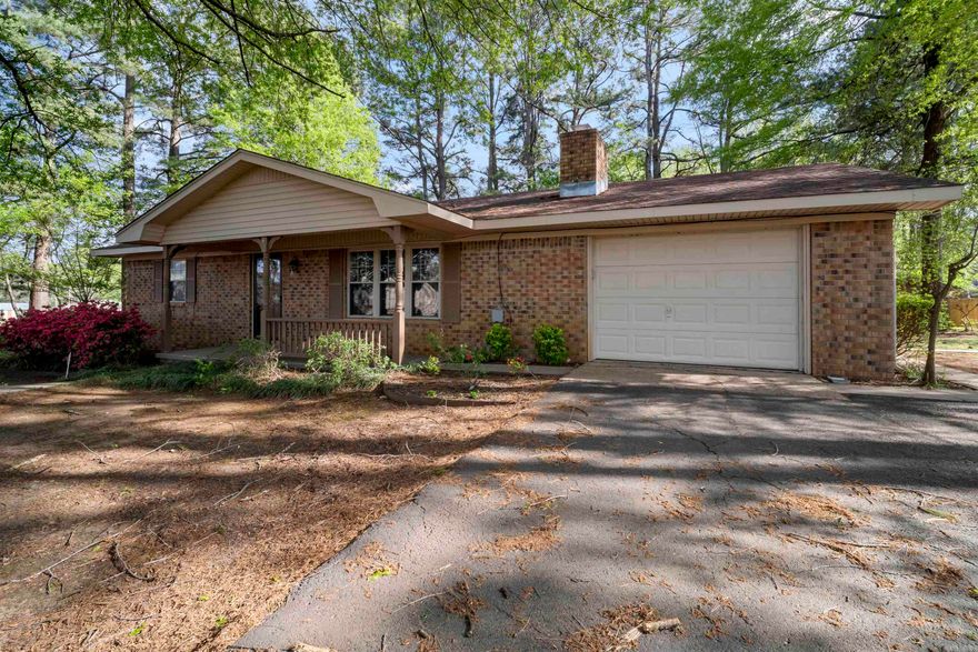 BACK ON MARKET! Sellers will assist with closing costs on acceptable offer!! Are you looking for a well-maintained home nestled within mature trees on approximately 2 acres in Greenbrier?  This home features 2 bedrooms and 2 full bathrooms with ample space to add on if desired. There is plenty of outside storage as well with 2 sheds and a lean on building!  Enjoy the simple life while drinking a tall glass of tea on the covered back porch. SCHEDULE YOUR SHOWINGS TODAY!