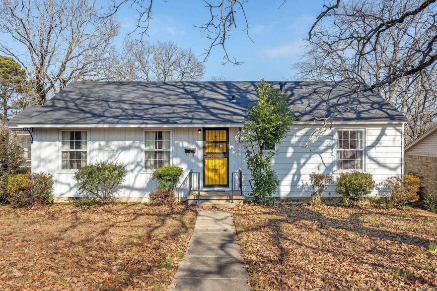 Welcome to your historic home in Park Hill. This cute and functional home has original hardwoods, extra parking, brand new countertops, fresh paint and more. It is located just a block from Idlewild Park and is close to the lakes at Lakewood. The square footage listed is for the main floor. There is also a heated and cooled walk out basement area waiting for you to finish out or turn into a great shop, man cave or craft space. It is already plumbed and framed for a full bath, so bring your creative side and make it what you want! A screened side porch, updated double pane windows, extra large closets and 30 year shingles are extras that will make you see what a great value this is. Don't miss the opportunity to join the Park Hill community. Refrigerator Conveys. Stackable washer and dryer are negotiable with good offer.