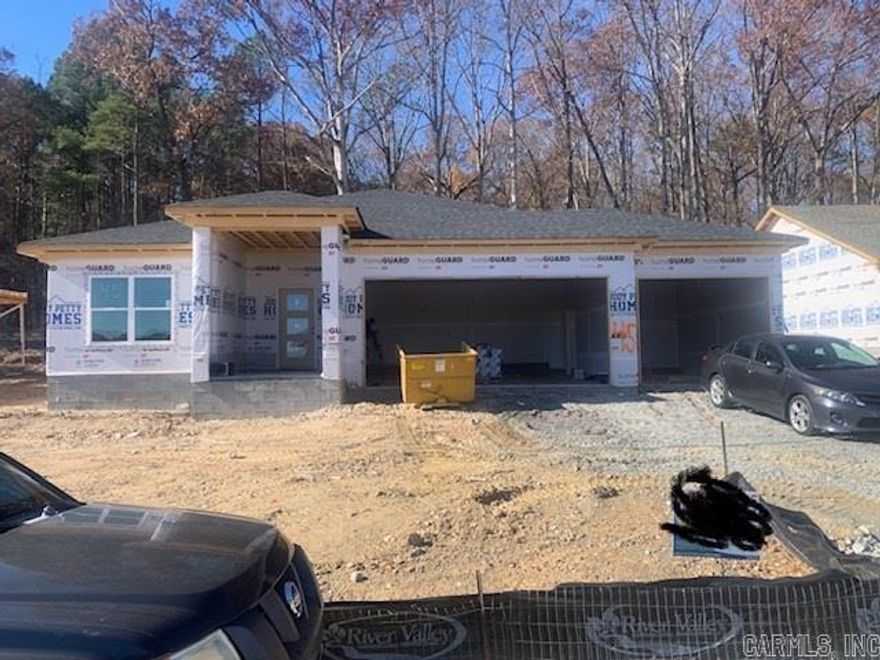 3 Bedroom, 2 Bath New construction home.  All Brick, 3 car garage.  Private back yard backing up to woods.  Hard Surface countertops, custom tile shower in primary bathroom.  10' ceilings in main areas.