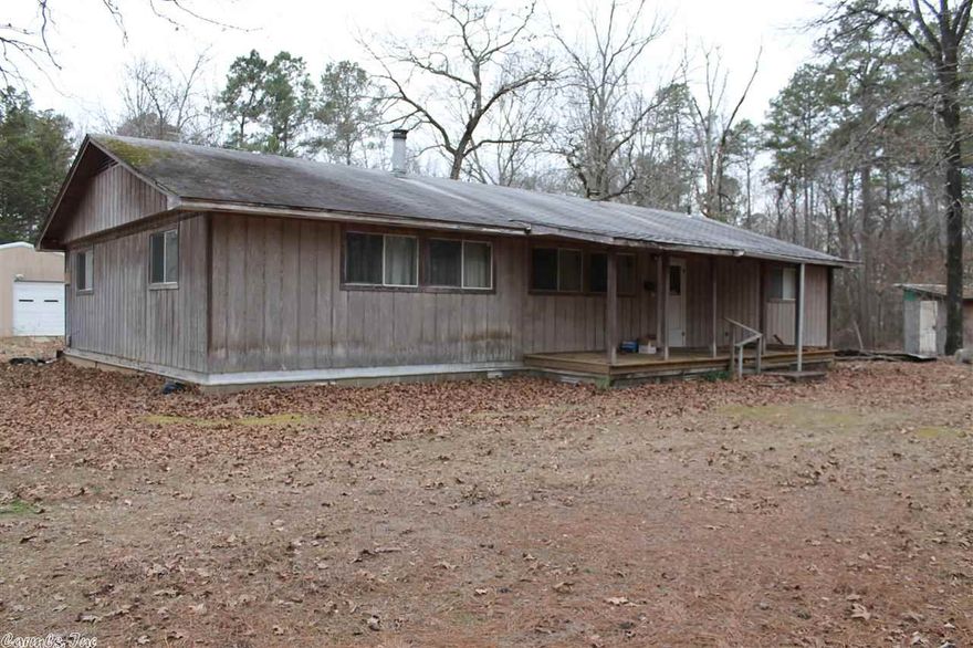 7.62 Acres-Perfect for someone looking for a country living project. 3 Bedroom 2 Bath fixer upper with large living room with wood burning stove. 576 Square foot pole barn and 720 square foot  metal building with full bath. Home to be sold as is-inspection welcome.