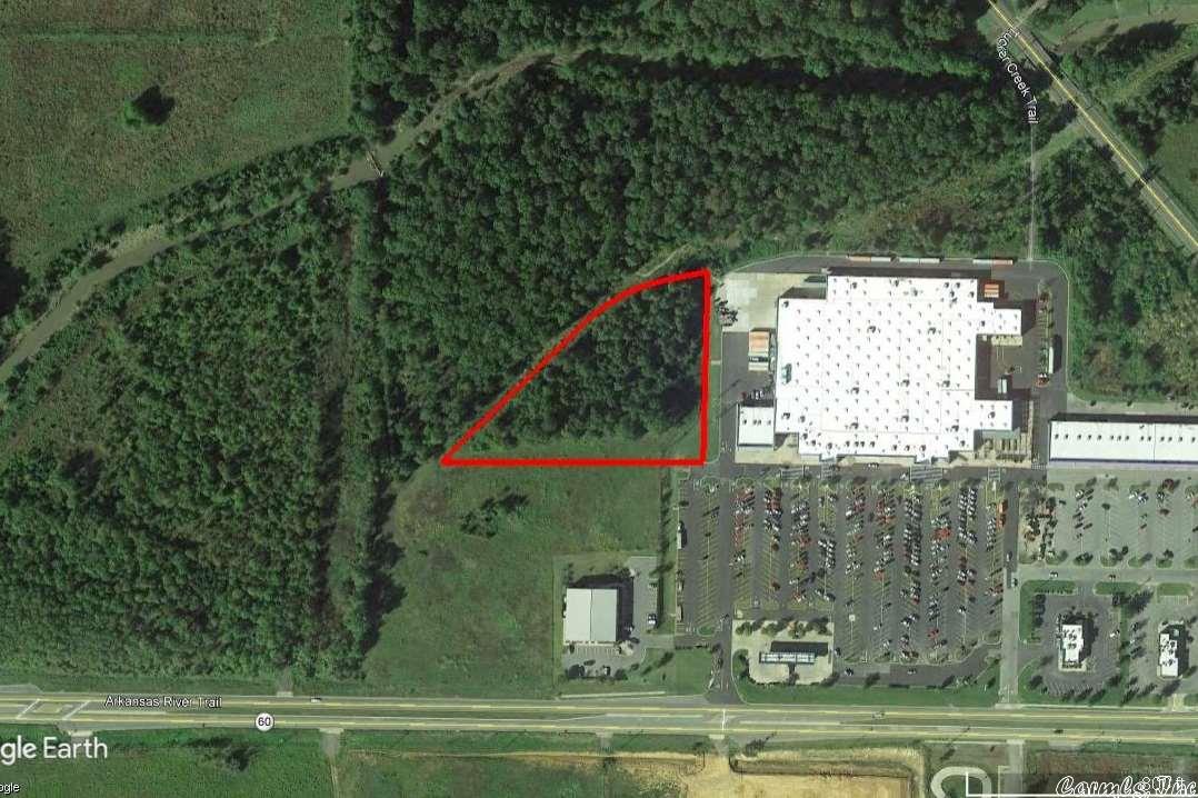 PRIME COMMERCIAL PROPERTY with great development potential. This +/- 3.00 acre parcel of land is located in Conway Marketplace shopping center adjacent to Walmart and other retailers. Zoned C-3. Multifamily Uses Permitted with Conditional Use Approval. Mineral Rights do not convey.