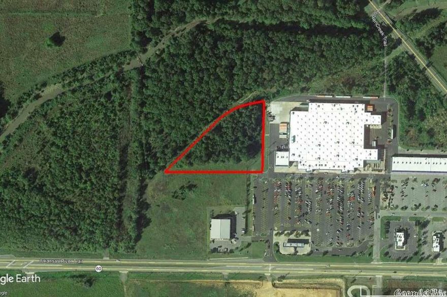 PRIME COMMERCIAL PROPERTY with great development potential. This +/- 3.00 acre parcel of land is located in Conway Marketplace shopping center adjacent to Walmart and other retailers. Zoned C-3. Multifamily Uses Permitted with Conditional Use Approval. Mineral Rights do not convey.