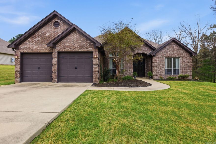 Beautiful one-level home in Pinewood Estates on a rare 1.30-acre level lot in the highly sought-after Bryant School District! This 4-bedroom, 2-bath home offers 2,040 sqft with a split-bedroom layout and a private primary suite. The open-concept great room features a cozy wood-burning fireplace and flows into a spacious kitchen with granite slab countertops, breakfast bar, pantry, and multiple dining options, including a separate dining room and breakfast area. Interior highlights include walk-in closets, a walk-in shower, tray ceilings, and a blend of wood, tile, and carpet flooring. Enjoy outdoor living in the fully fenced backyard with a covered patio—perfect for entertaining or relaxing. Two-car garage, insulated windows, and extra landscaping add to the appeal. Qualifies for RD (Rural Development) financing and offers convenient access to Bryant and surrounding areas.