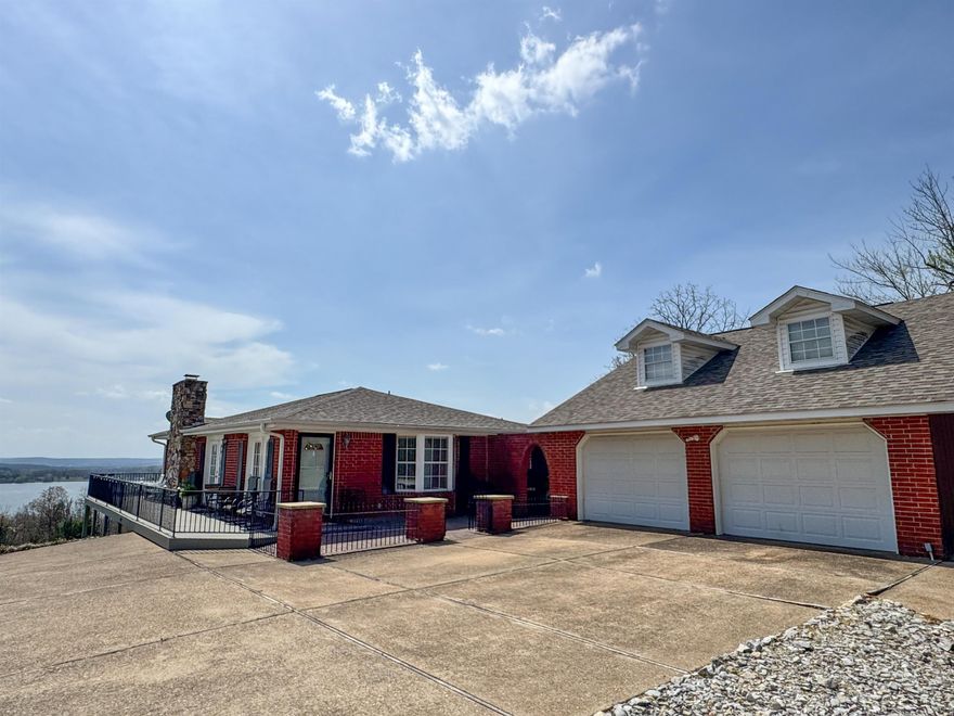 If you’ve been looking for a home with a beautiful view of Crown Lake without the lakefront price tag, this one is worth a closer look. This 3 bed, 3 bath home sits on 3 lots and offers 2,492 sq ft with a layout designed for both everyday living and hosting. The main level features a spacious living area with large windows and access to an expansive deck—perfect for enjoying the view. The primary suite is also on the main level and has been thoughtfully expanded to include a sitting or office space. Downstairs, the walkout basement offers 2 additional bedrooms, 1 full bath, and a second living area, providing flexible space for guests or entertaining. The 2-car garage includes a workshop and unfinished attic space for storage or future possibilities. Peaceful setting, generous space, and a view that truly sets this property apart.