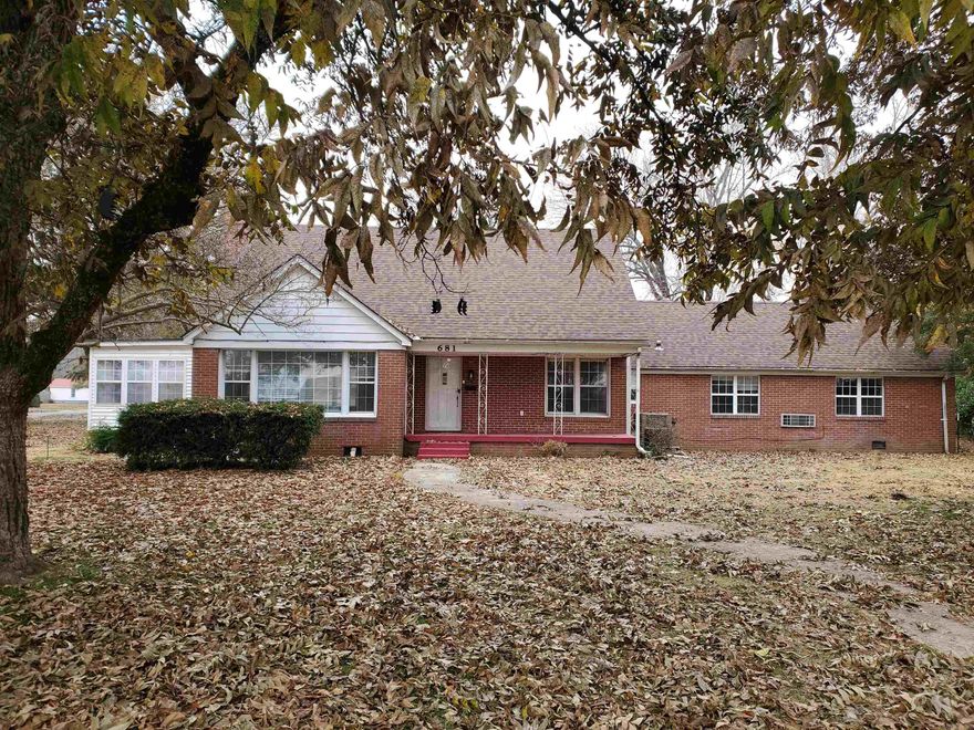Charming Mid-Century Home on a Spacious 0.54-Acre Lot – 681 S. Garfield St., Piggott, AR 72454  Discover timeless craftsmanship and modern updates in this beautifully maintained 4-bedroom, 2-bath home offering 2,926 square feet of comfortable living space. Nestled on a generous 0.54-acre lot, this brick residence is surrounded by large shade trees, creating a serene and inviting atmosphere.  Step inside to appreciate the hallmark quality of mid-century construction, complemented by fresh interior paint and thoughtful updates throughout. A new roof adds peace of mind, while the asphalt driveway leads to a convenient two-car garage.  Perfect for families or anyone seeking space and comfort, this property blends classic style with practical features—providing room to grow both inside and out. Located in a quiet, established neighborhood of Piggott, this home offers the ideal balance of charm, convenience, and durability.
