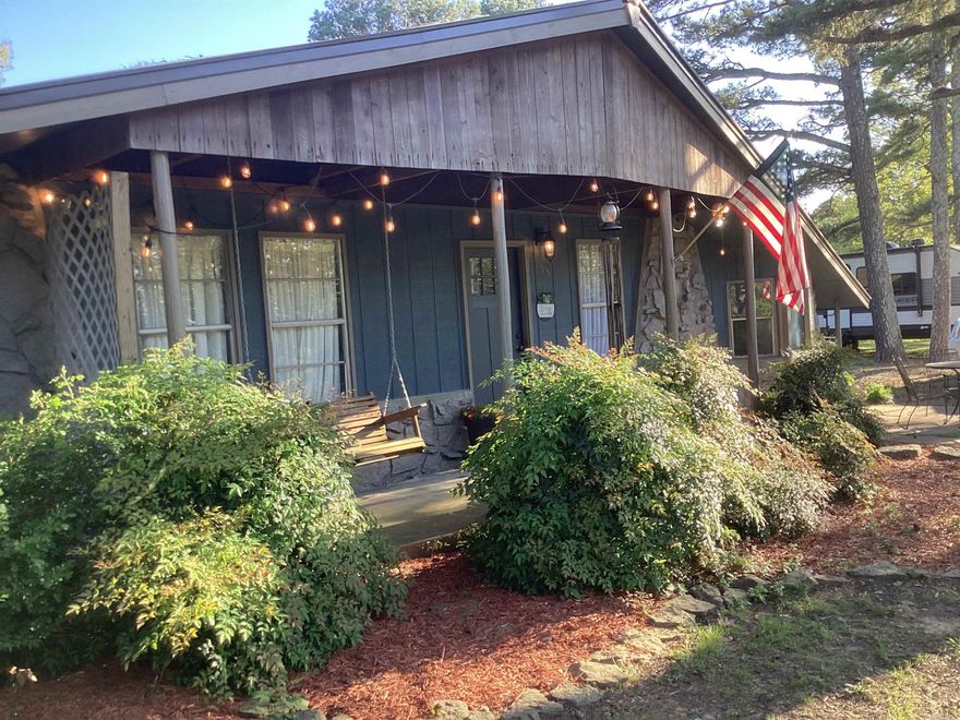 ** REDUCED ** Looking for the peacefulness of the country within the city limits? Check out this remodeled rustic home on Pine Ridge that overlooks the town. You will feel like you've just entered a state park when you drive up the ridge. Located above the park and tucked away on a quiet 3 acre + lot on Pine Ridge Rd. This is a peaceful neighborhood with privacy and convenience. This home is only a mile from Rose Bud schools and the Rose Bud city park is just a short walk or bike ride away! Dreaming of having chickens, goats, or horses? Chicken coop and animal pen are part of the deal! Nice big backyard area and also hunting or four-wheeling in the woods out back.  Property highlights - acreage that's perfect for family fun, entertaining, and even a soak in the private hot tub. Lots of remodeling done, 3 bed / 2 bath home, rustic modern farmhouse style updates. Workshop, office, extra storage and spacious laundry room.  Major updates - gas fireplace, newer flooring and paint, refaced kitchen cabinetry, all appliances, sinks, faucets. Metal roof (2023), HVAC (2019), water heater {late 2023). This is a rare find - peaceful, private, and waiting for its new owner. Start packing!