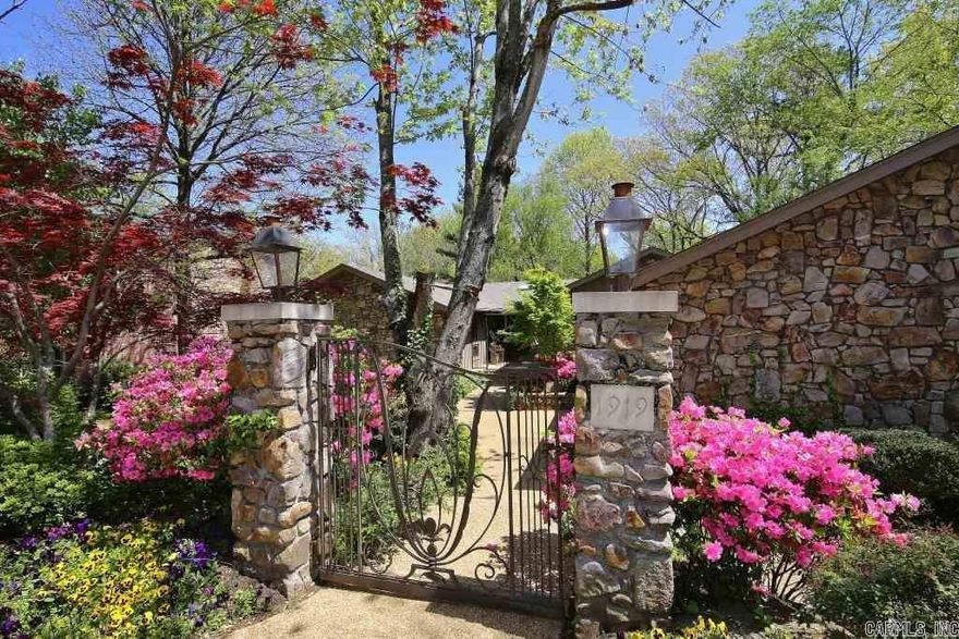 Exceptional home nestled in a beautiful backyard wooded setting.  Excellent Heights location, one block from the Country Club of Little Rock.  A multitude of windows allows fantastic light filled spaces. The primary bedroom plus and an additional ensuite bedroom is on the main level. Primary bedroom has an outstanding bathroom with three closets, built in dressers and two vanities with an abundance of counterspace. This home has 3 living areas, 3 fireplaces, an office/drop space with great cabinetry off of the two car garage.  Large laundry on the main level with 2nd sink and space for 2nd refrigerator.  Some outstanding features are: open flowing floor plan, spacious living and dining areas, a large redone gourmet kitchen, breakfast table space, gorgeous vaulted ceilings, double glass door entry into the foyer, and a trek deck off the main level. Two more bedrooms and one bath down plus a living space with fireplace.  Another level of decking is off of this level.  Sellers have floor plans to expand home if interested.  If you are the market for a new home and wish to be in the Heights, please take the time to see this remarkable home!