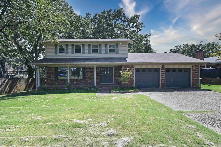 PERFECT LOCATION! A Solid family home on the prettiest lot is waiting to be your home. Four good size bedrooms, 2 full baths and a handy half bath. Formal Living Room, Den, and Separate Dining. Also has an oversized garage. Good storage throughout. Ready to be transformed to your tastes and it will be a wonderful home for years to come!