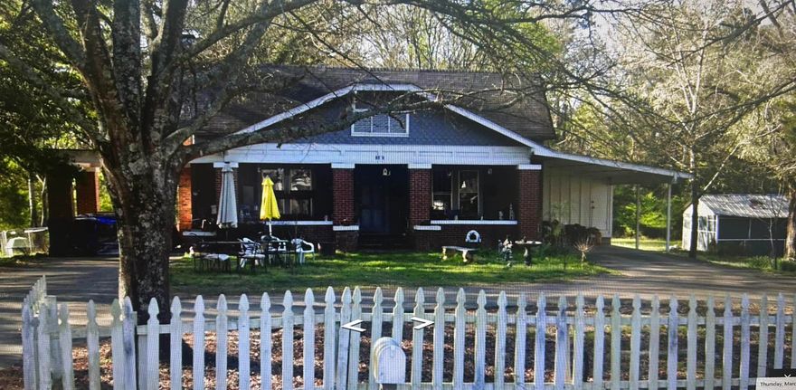 Welcome to 1005 Elm Street—a spacious, inviting home boasting 2,412 square feet of comfortable living space. Featuring four generously sized bedrooms and three full bathrooms, this residence offers plenty of room for family and guests. Enjoy a large living room, formal dining area, and a well-appointed kitchen with an adjacent laundry room for convenience. The charming front porch is perfect for relaxing outdoors, whether you're entertaining friends or savoring a quiet evening. Bring your unique vision and style to make this beautiful property truly your own.