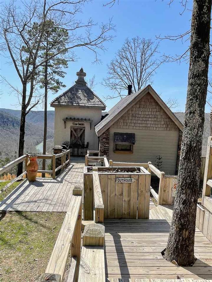 Private weekend getaway cabin with breathtaking views. This has that "Million Dollar View you've been looking for!" Great weekend rental potential. HoneyMoon Getaway, RV hookup, tankless water heater, Vaulted Ceilings Led Lighting & much more. Custom Built Craftsman design home w/ loft. Fully furnished including, real wood burning fireplace, & Open balcony to enjoy the views of The Little Red River Far Below, Mountains Vista Views & Little Red River Access a few miles away. Peaceful Retreat w/ No Neighbors!