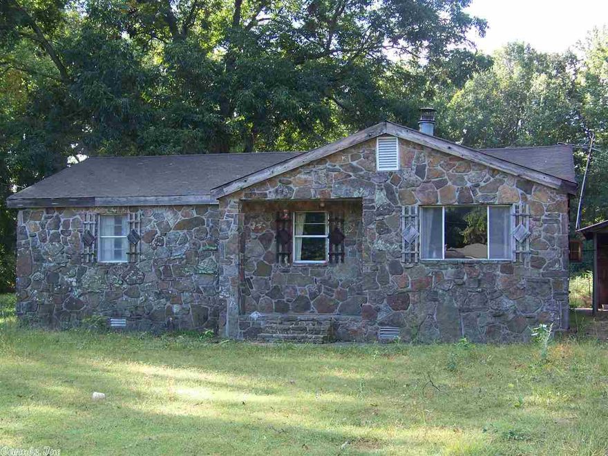 Country home with hardwood floors, eat in kitchen, sunroom & storm cellar.  Property is being sold AS IS WHERE IS ~ TERMITE DAMAGE IN DINING AREA ~ IT WILL BE THE BUYERS RESPONSIBILITY TO HAVE UTILITIES TURNED ON FOR INSPECTION